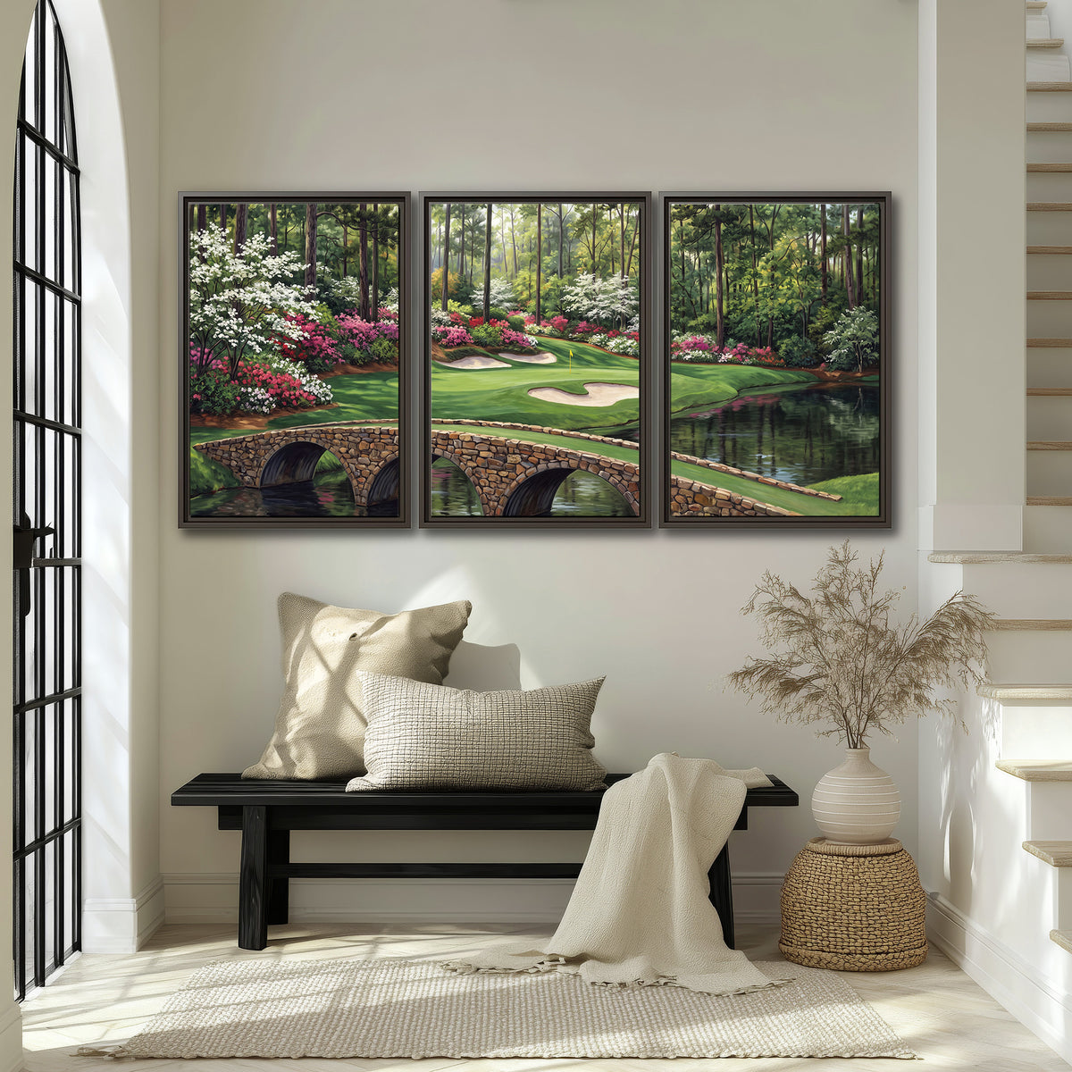 An arched stone bridge beside a landscaped golf course and reflective pond 3 piece framed canvas wall art displayed in a entryway
