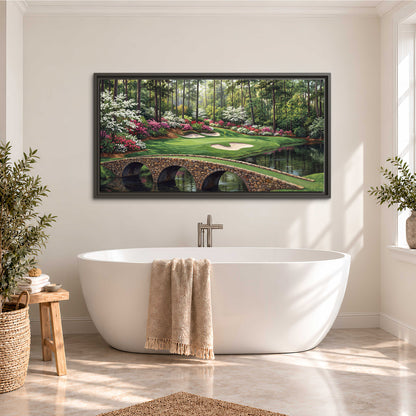 An arched stone bridge beside a landscaped golf course and reflective pond single framed canvas wall art styled in an interior