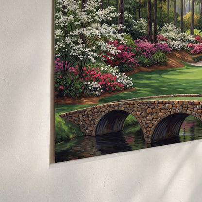 An arched stone bridge beside a landscaped golf course and reflective pond set of 3 poster prints material and edge close up