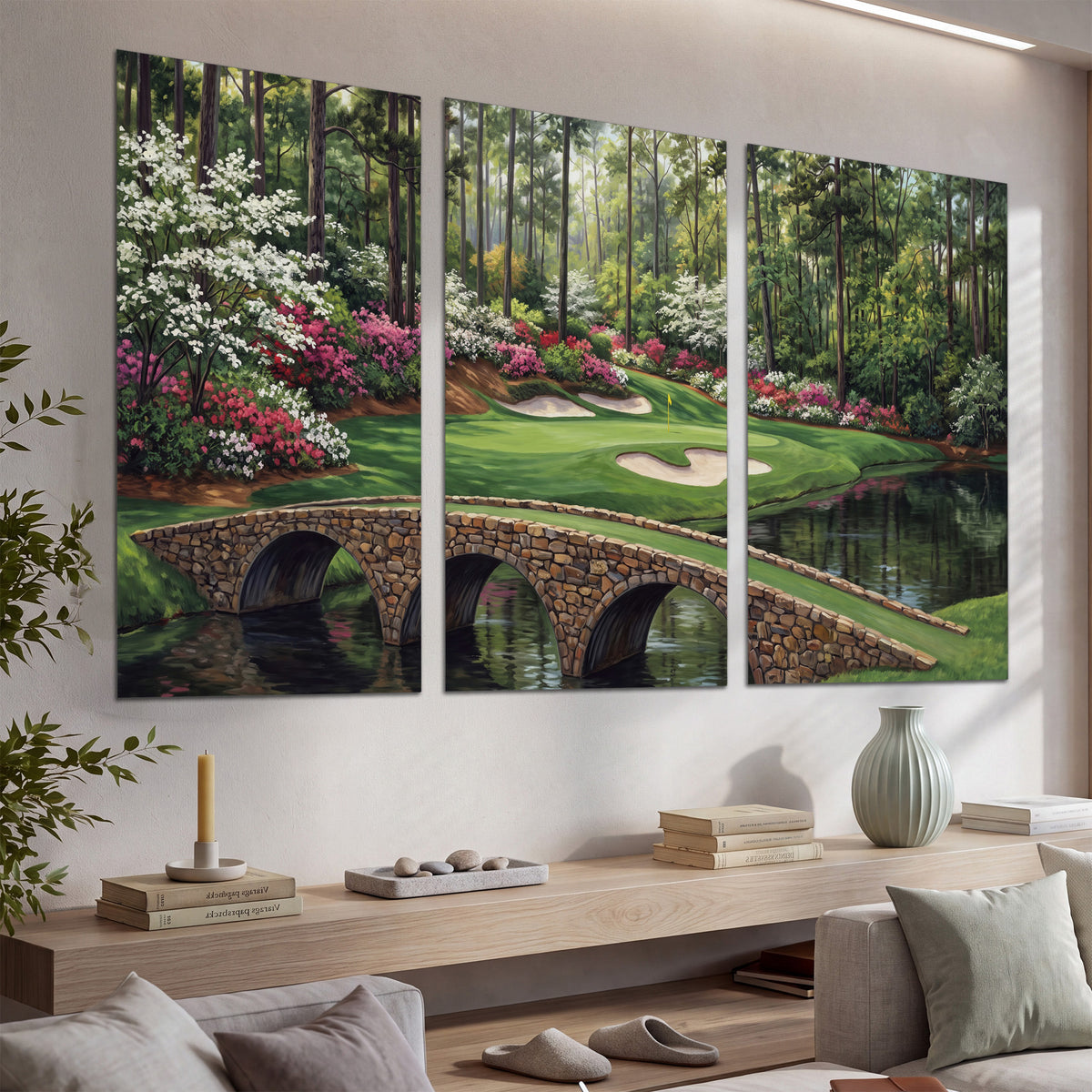 An arched stone bridge beside a landscaped golf course and reflective pond set of 3 poster prints displayed in a console