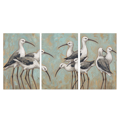 Long-legged white and gray wading birds against a muted aqua background 3 piece canvas wall art viewed straight on