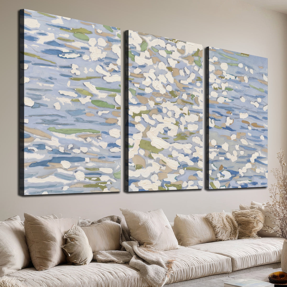 Loose pale blue, white and soft green marks suggesting shimmering water 3 piece canvas wall art room and product view