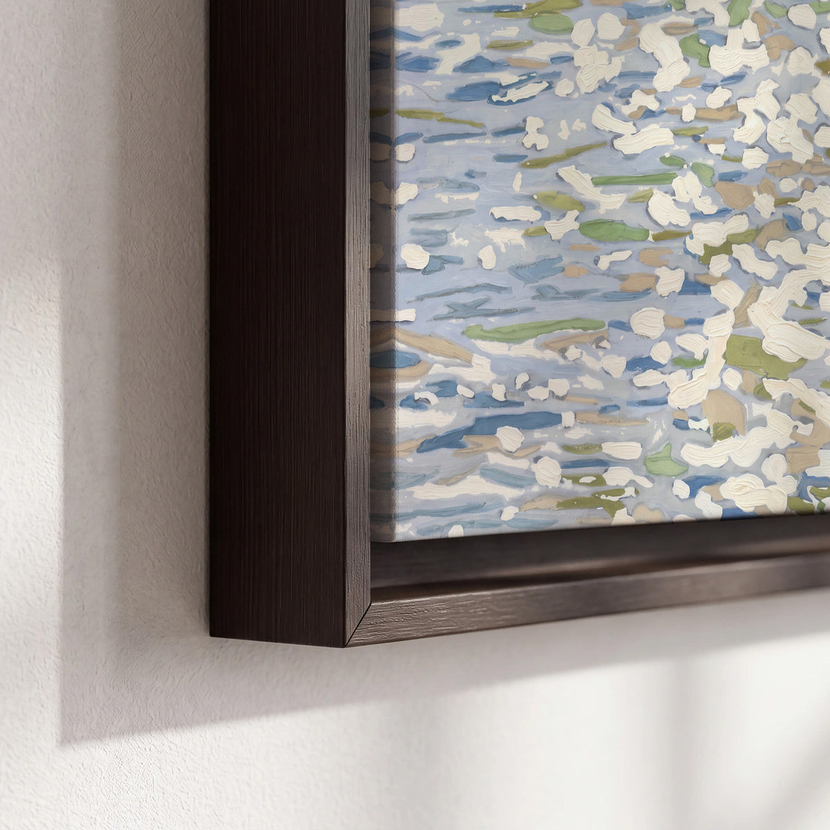 Loose pale blue, white and soft green marks suggesting shimmering water 3 piece framed canvas wall art material and edge close up