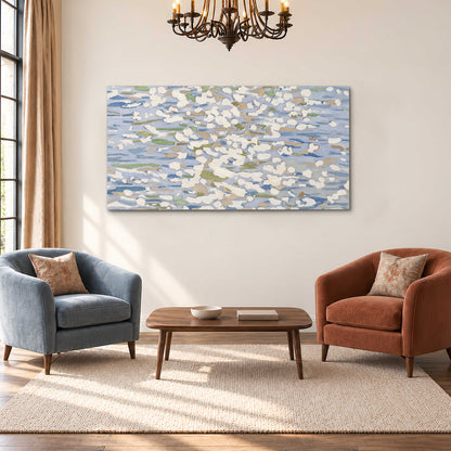 Loose pale blue, white and soft green marks suggesting shimmering water single canvas wall art styled in an interior