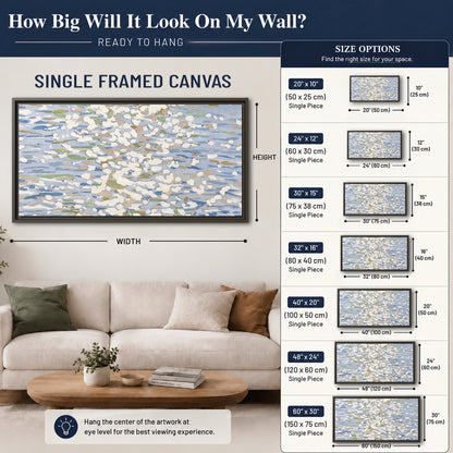 Loose pale blue, white and soft green marks suggesting shimmering water single framed canvas wall art size guide above a sofa; room view is illustrative