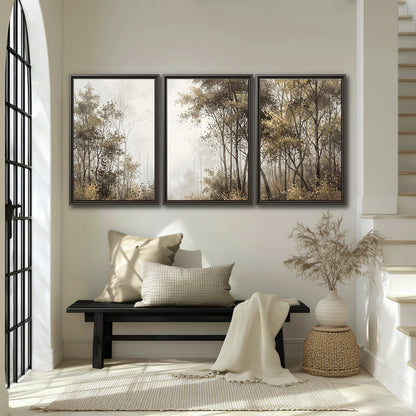 Tall autumn trees framing a pale misty woodland clearing 3 piece framed canvas wall art displayed in a entryway