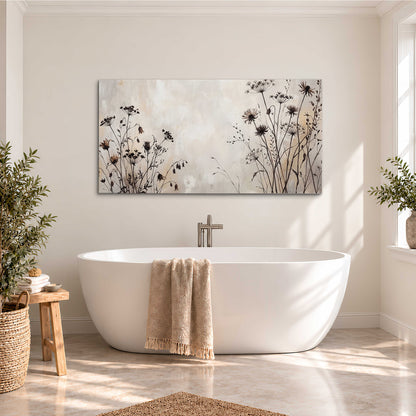 Fine dark wildflower stems and seed heads against soft beige single canvas wall art styled in an interior