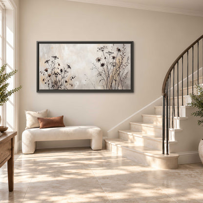 Fine dark wildflower stems and seed heads against soft beige single framed canvas wall art styled in an interior