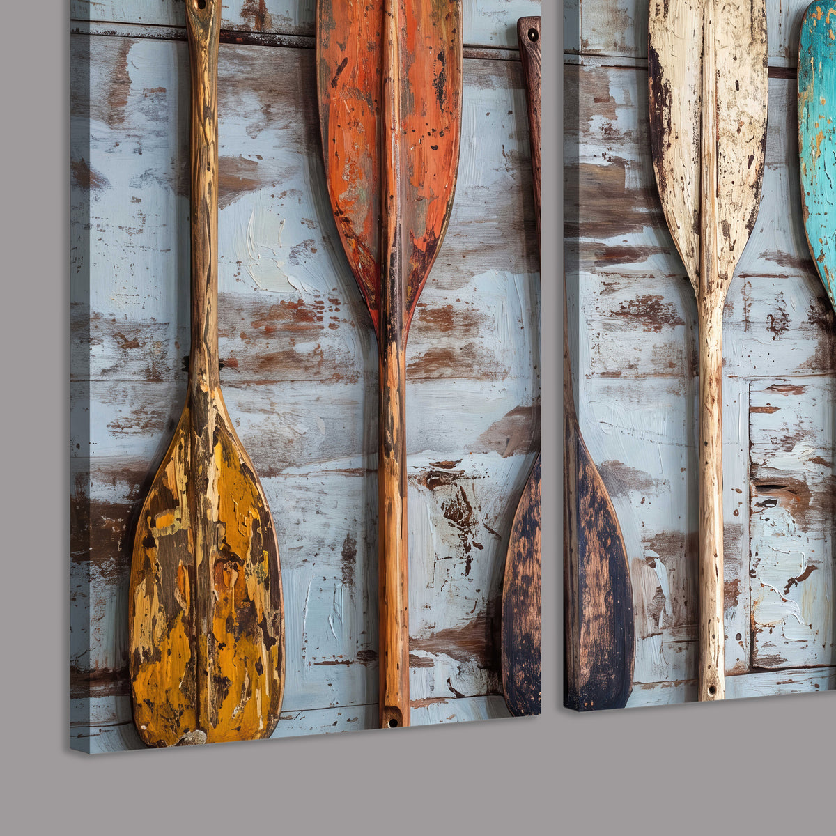A row of colorful weathered wooden oars against pale blue boards 3 piece canvas wall art room and product view
