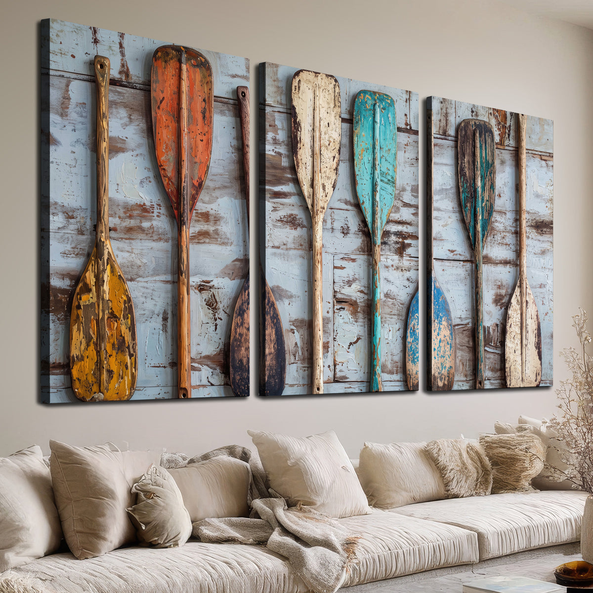 A row of colorful weathered wooden oars against pale blue boards 3 piece canvas wall art room and product view