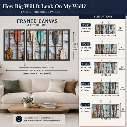 A row of colorful weathered wooden oars against pale blue boards 3 piece framed canvas wall art size guide above a sofa; room view is illustrative