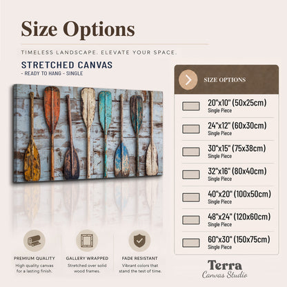 A row of colorful weathered wooden oars against pale blue boards single canvas wall art available dimensions