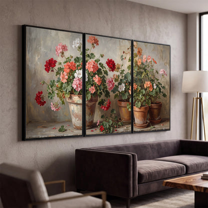 Colorful flowers arranged in rustic pots on a warm neutral background 3 piece framed canvas wall art displayed in a modern living room