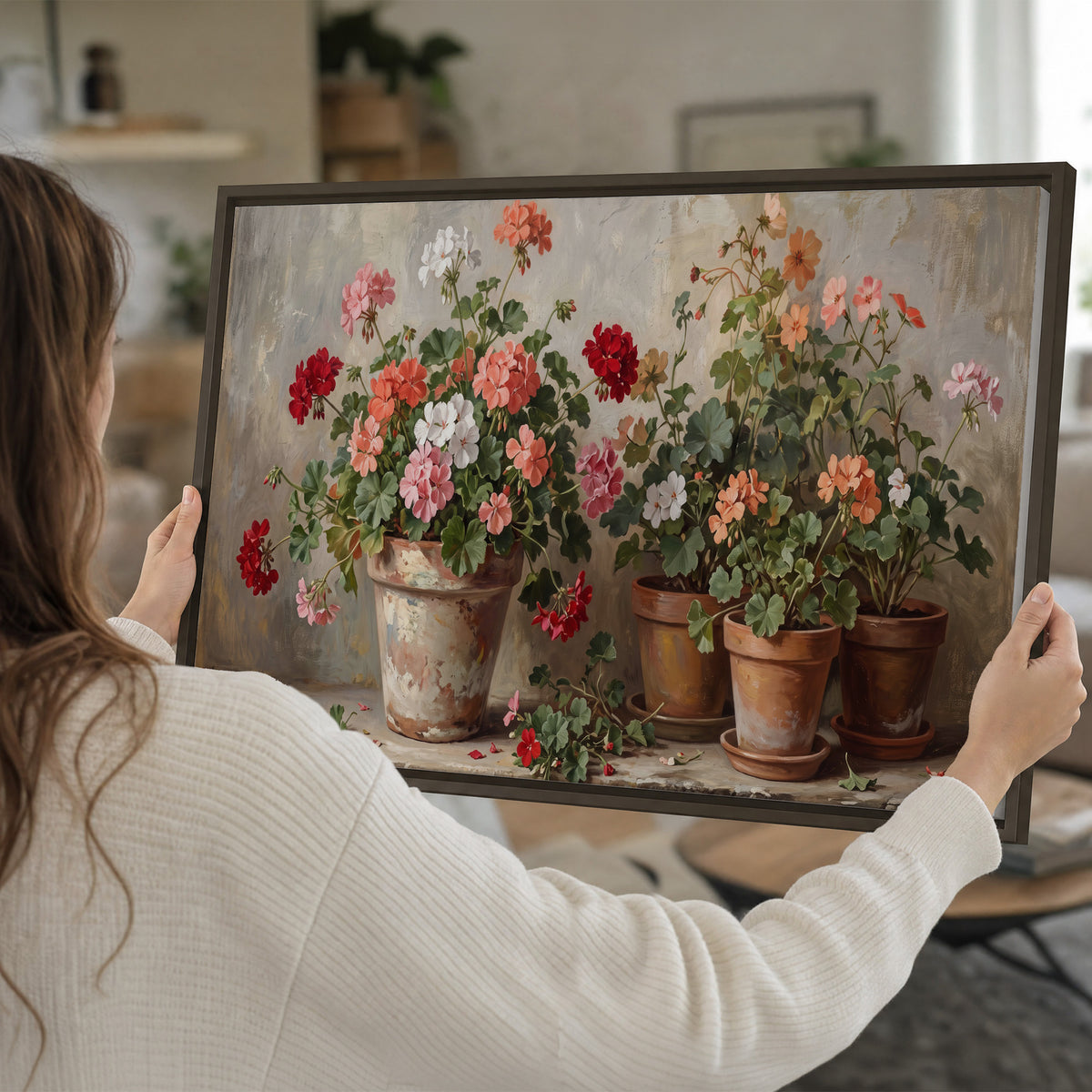 Colorful flowers arranged in rustic pots on a warm neutral background single framed canvas wall art held in hands