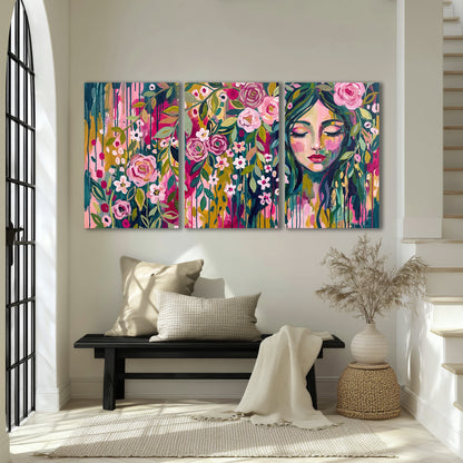 A woman's portrait surrounded by vivid flowers and expressive colorful marks 3 piece canvas wall art displayed in a entryway