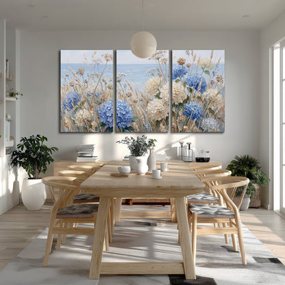 Blue hydrangeas and delicate ivory wildflowers beneath a pale blue sky 3 piece canvas wall art room and product view