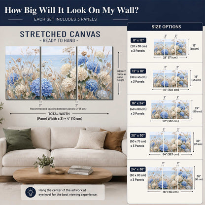 Blue hydrangeas and delicate ivory wildflowers beneath a pale blue sky 3 piece canvas wall art size guide above a sofa; room view is illustrative