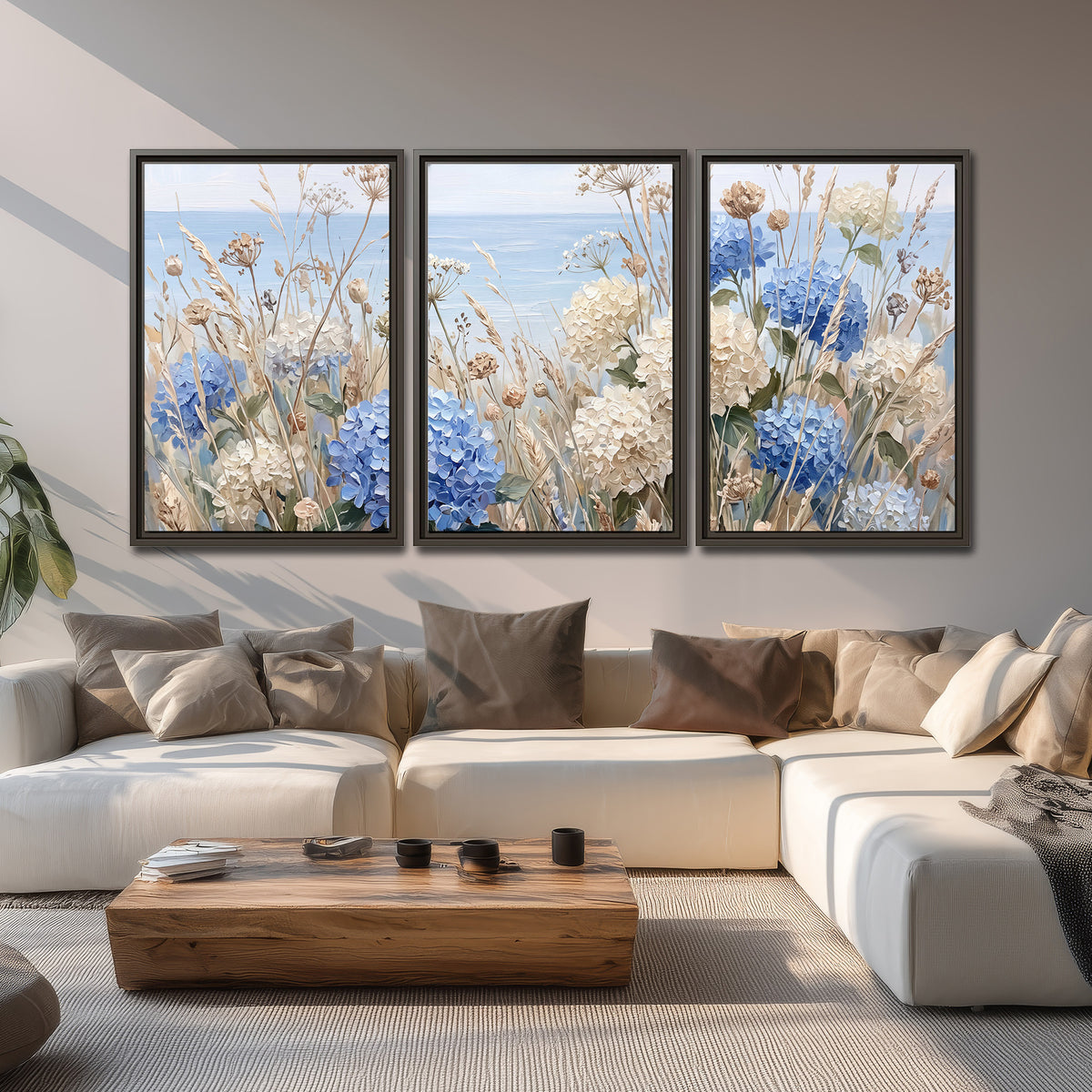 Blue hydrangeas and delicate ivory wildflowers beneath a pale blue sky 3 piece framed canvas wall art displayed in a living room