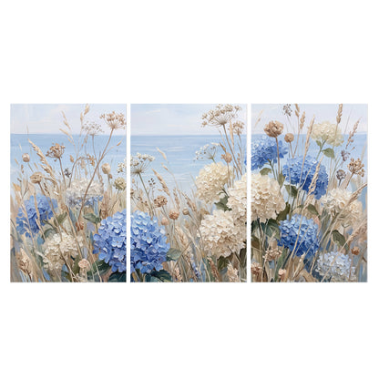 Blue hydrangeas and delicate ivory wildflowers beneath a pale blue sky set of 3 poster prints viewed straight on
