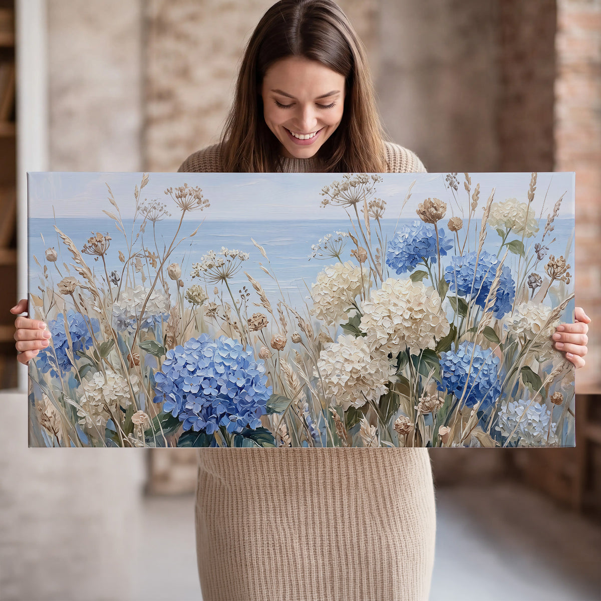 Blue hydrangeas and delicate ivory wildflowers beneath a pale blue sky single canvas wall art held in hands