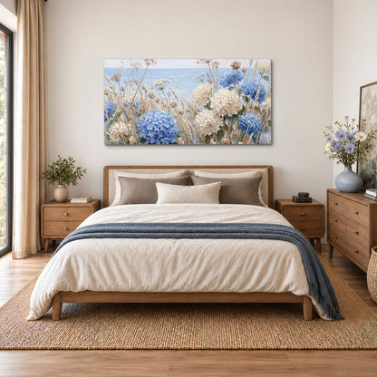 Blue hydrangeas and delicate ivory wildflowers beneath a pale blue sky single canvas wall art styled in an interior