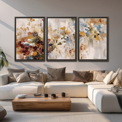 Loose cream, ochre and rust floral shapes with expressive painted-style marks 3 piece framed canvas wall art displayed in a living room