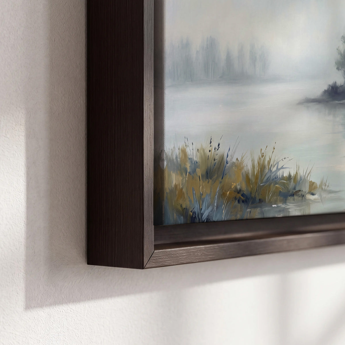 A calm pale lake bordered by dark evergreen trees and distant mist 3 piece framed canvas wall art material and edge close up