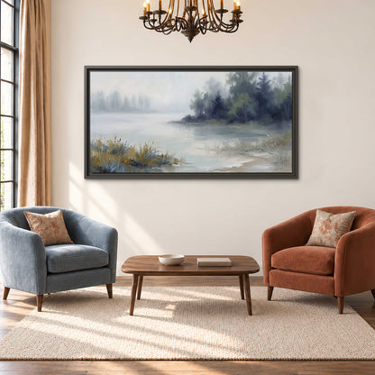 A calm pale lake bordered by dark evergreen trees and distant mist single framed canvas wall art styled in an interior