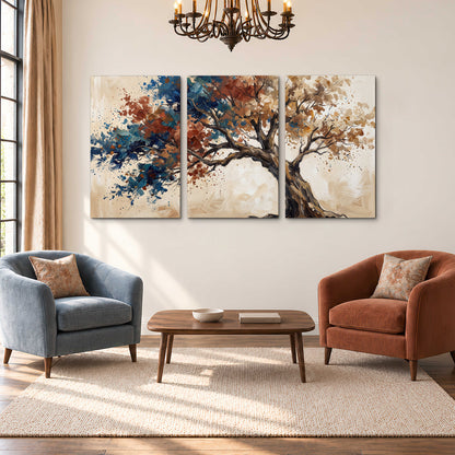 A broad tree with rust, blue and ochre foliage against warm cream 3 piece canvas wall art styled in an interior
