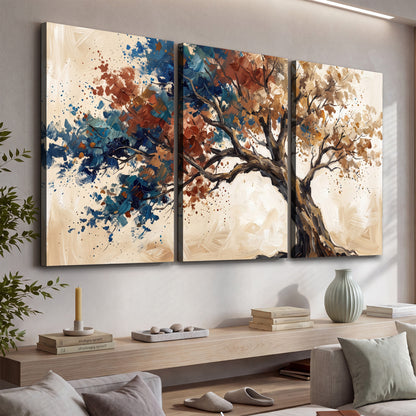 A broad tree with rust, blue and ochre foliage against warm cream 3 piece canvas wall art displayed in a console