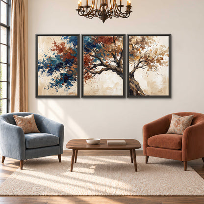 A broad tree with rust, blue and ochre foliage against warm cream 3 piece framed canvas wall art styled in an interior