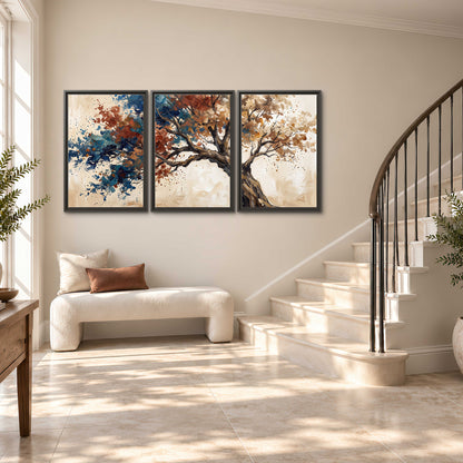 A broad tree with rust, blue and ochre foliage against warm cream 3 piece framed canvas wall art styled in an interior