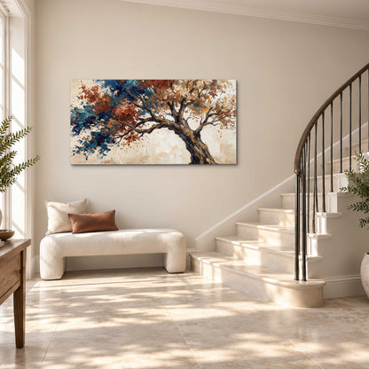 A broad tree with rust, blue and ochre foliage against warm cream single canvas wall art styled in an interior