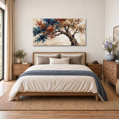 A broad tree with rust, blue and ochre foliage against warm cream single canvas wall art styled in an interior