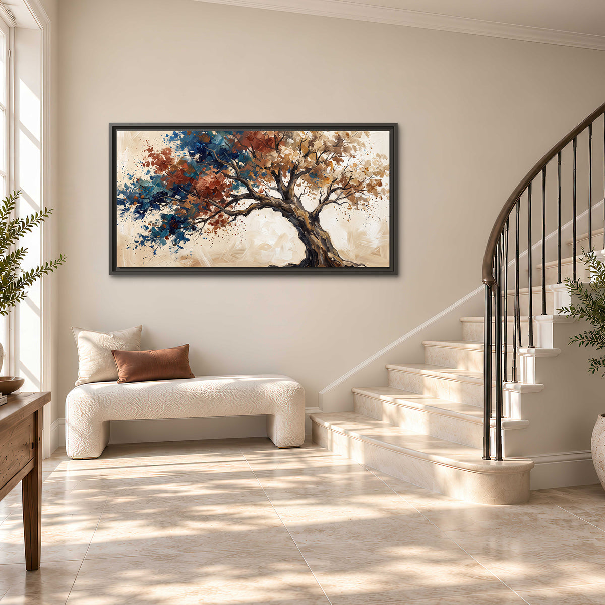 A broad tree with rust, blue and ochre foliage against warm cream single framed canvas wall art styled in an interior
