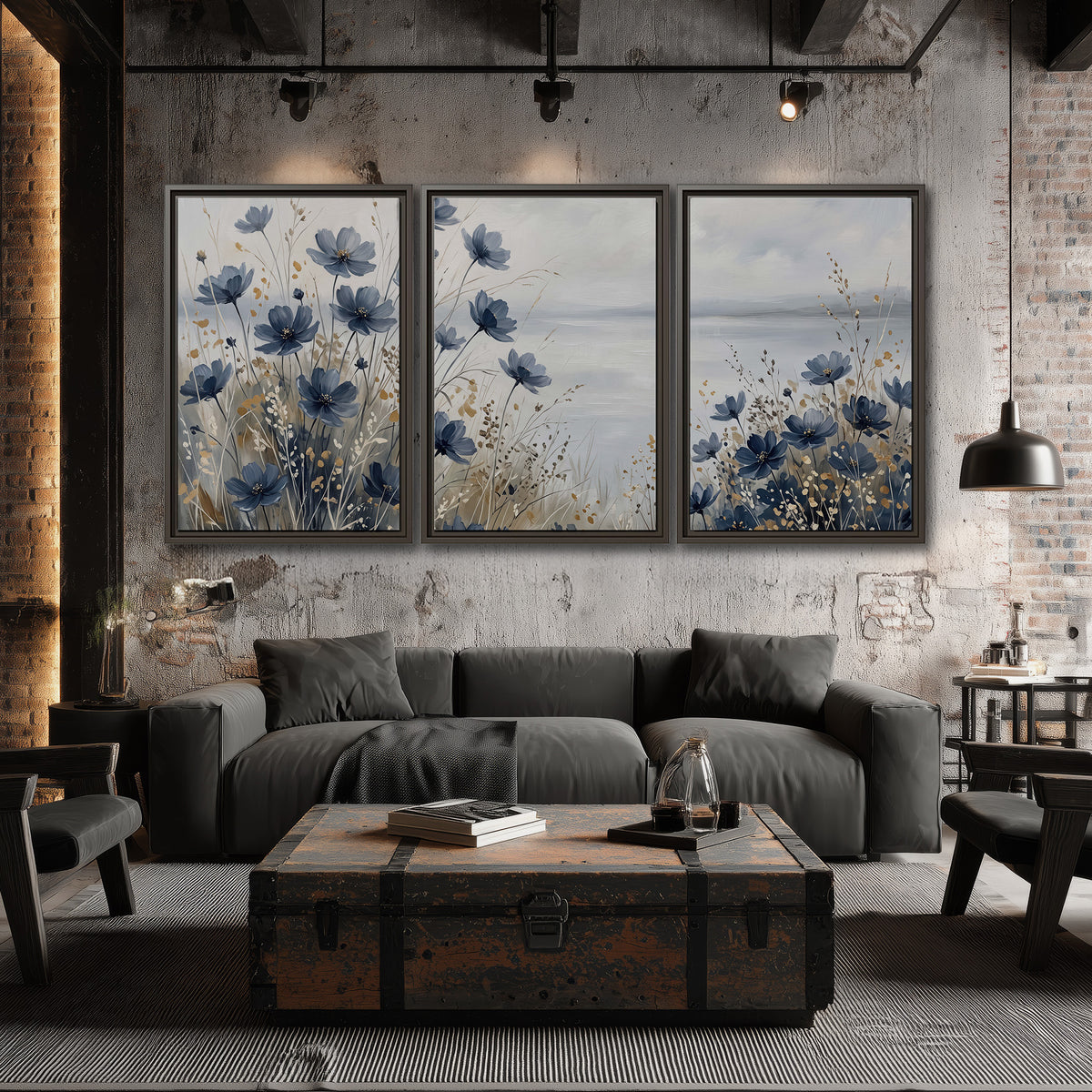 Soft blue flowers and ivory grasses beside a pale coastal horizon 3 piece framed canvas wall art displayed in a industrial room