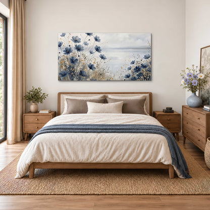Soft blue flowers and ivory grasses beside a pale coastal horizon single canvas wall art styled in an interior