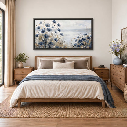 Soft blue flowers and ivory grasses beside a pale coastal horizon single framed canvas wall art styled in an interior