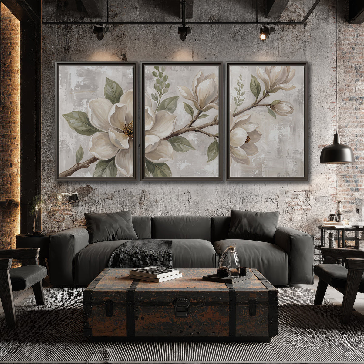 Large ivory magnolia blossoms and soft green leaves on pale gray 3 piece framed canvas wall art displayed in a industrial room
