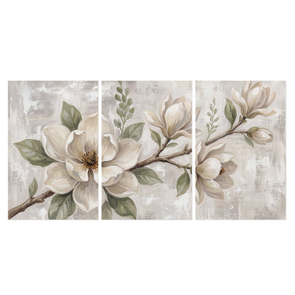 Large ivory magnolia blossoms and soft green leaves on pale gray set of 3 poster prints viewed straight on