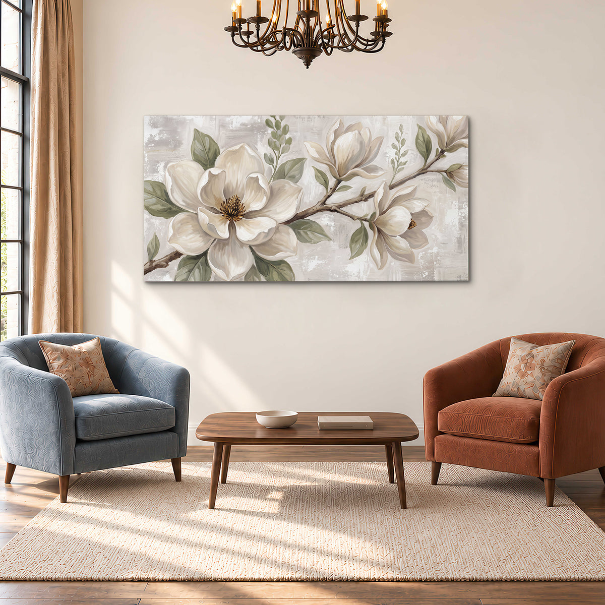 Large ivory magnolia blossoms and soft green leaves on pale gray single canvas wall art styled in an interior