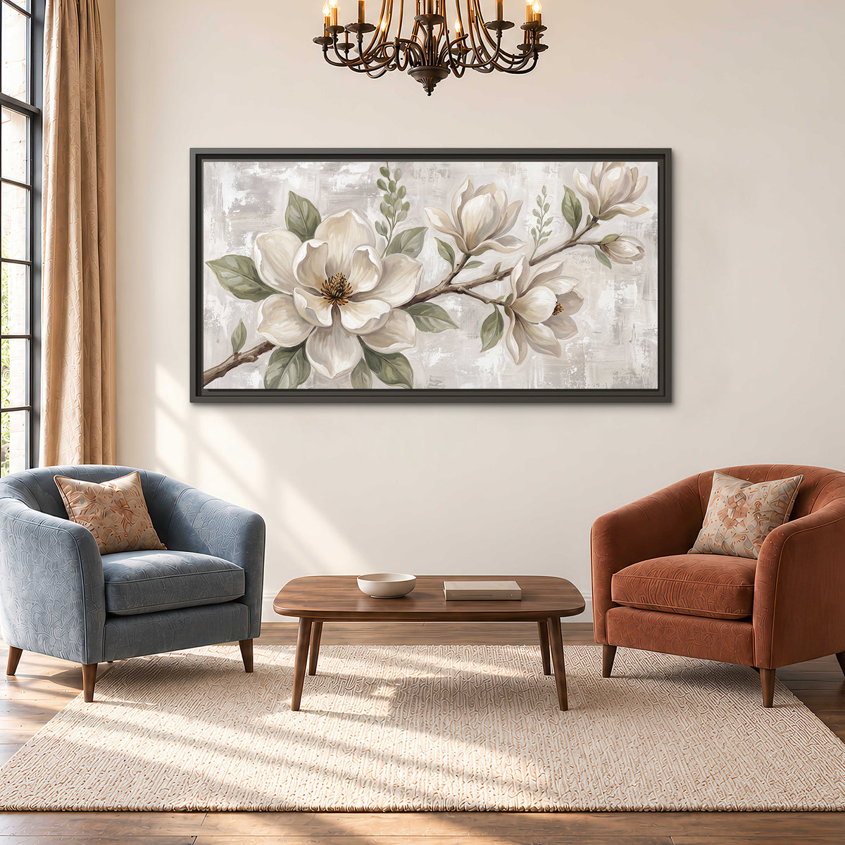 Large ivory magnolia blossoms and soft green leaves on pale gray single framed canvas wall art styled in an interior