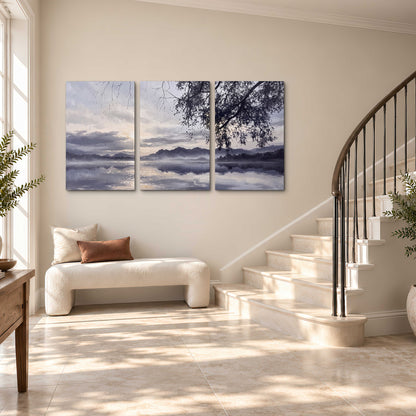 Quiet gray-blue water and dark overhanging branches beneath evening clouds 3 piece canvas wall art styled in an interior