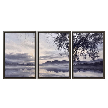 Quiet gray-blue water and dark overhanging branches beneath evening clouds 3 piece framed canvas wall art viewed straight on