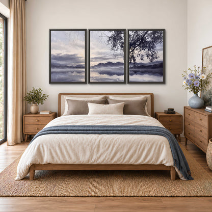 Quiet gray-blue water and dark overhanging branches beneath evening clouds 3 piece framed canvas wall art styled in an interior