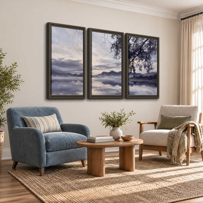Quiet gray-blue water and dark overhanging branches beneath evening clouds 3 piece framed canvas wall art styled in an interior