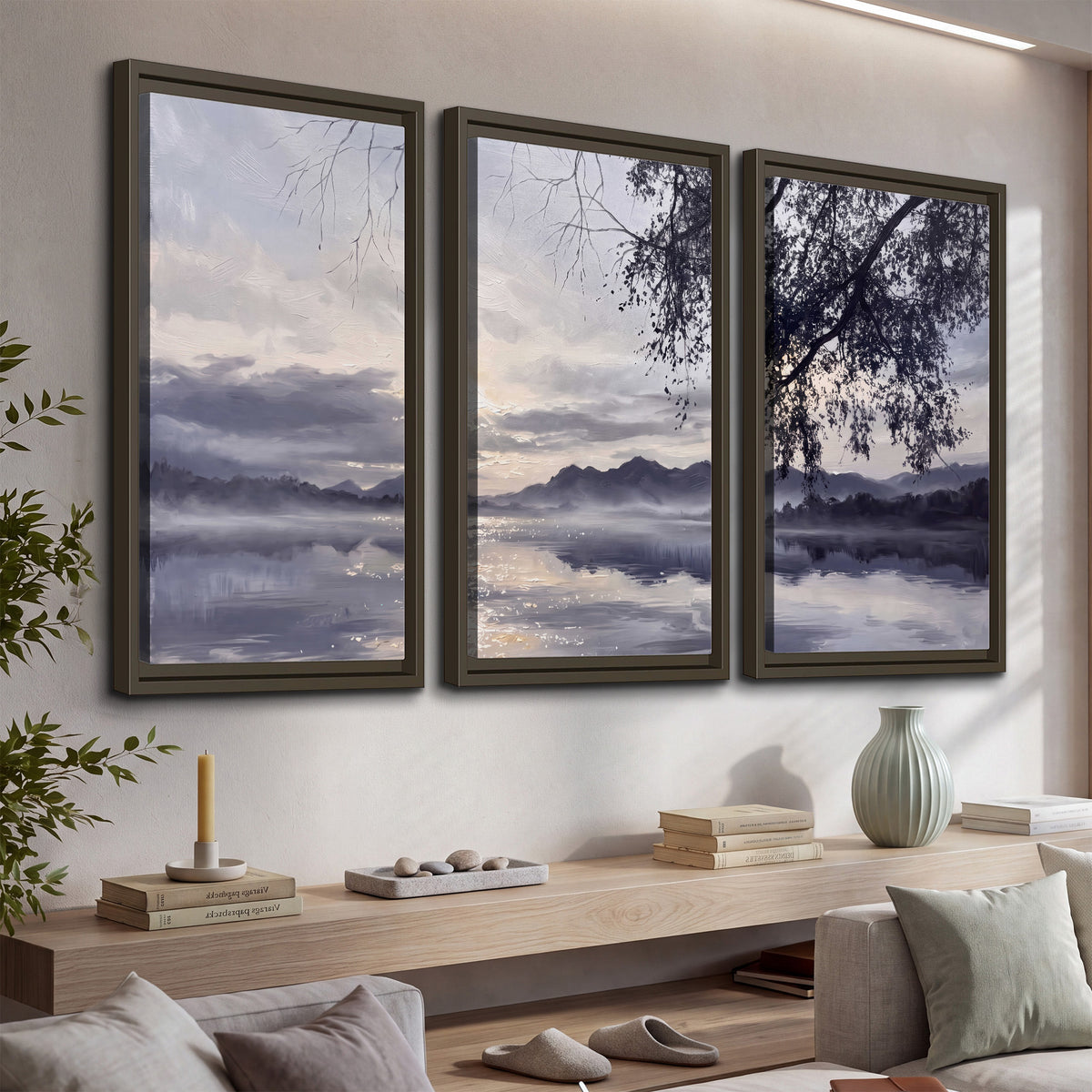 Quiet gray-blue water and dark overhanging branches beneath evening clouds 3 piece framed canvas wall art displayed in a console