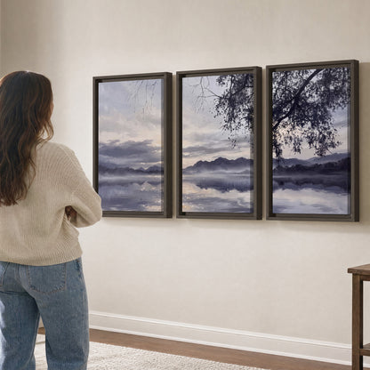 Quiet gray-blue water and dark overhanging branches beneath evening clouds 3 piece framed canvas wall art three panel arrangement on a wall
