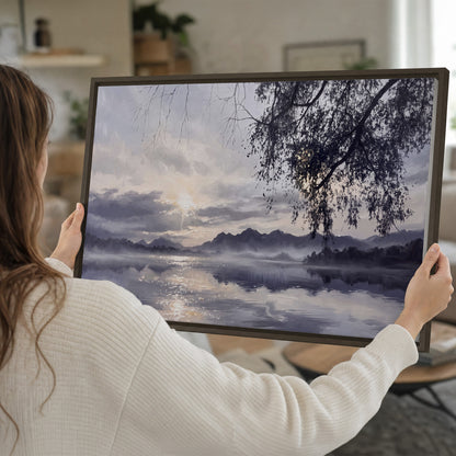 Quiet gray-blue water and dark overhanging branches beneath evening clouds single framed canvas wall art held in hands