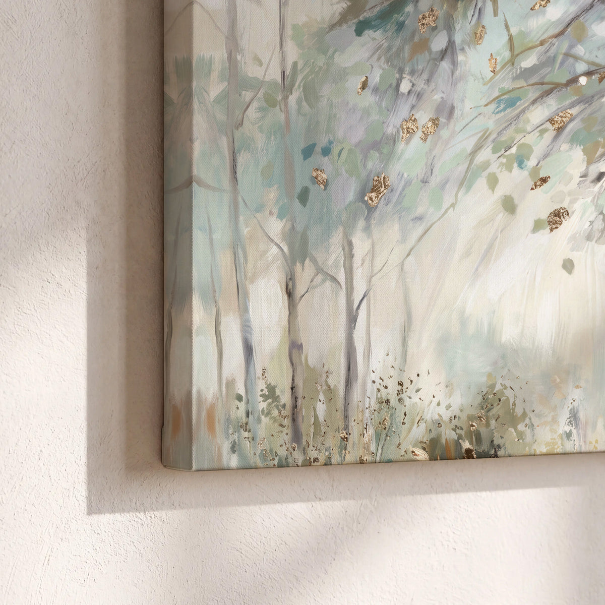 Slender woodland trunks and delicate branches in soft green and cream 3 piece canvas wall art material and edge close up